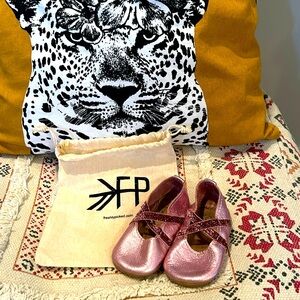 Freshly picked shiny pink, leather ballet shoes